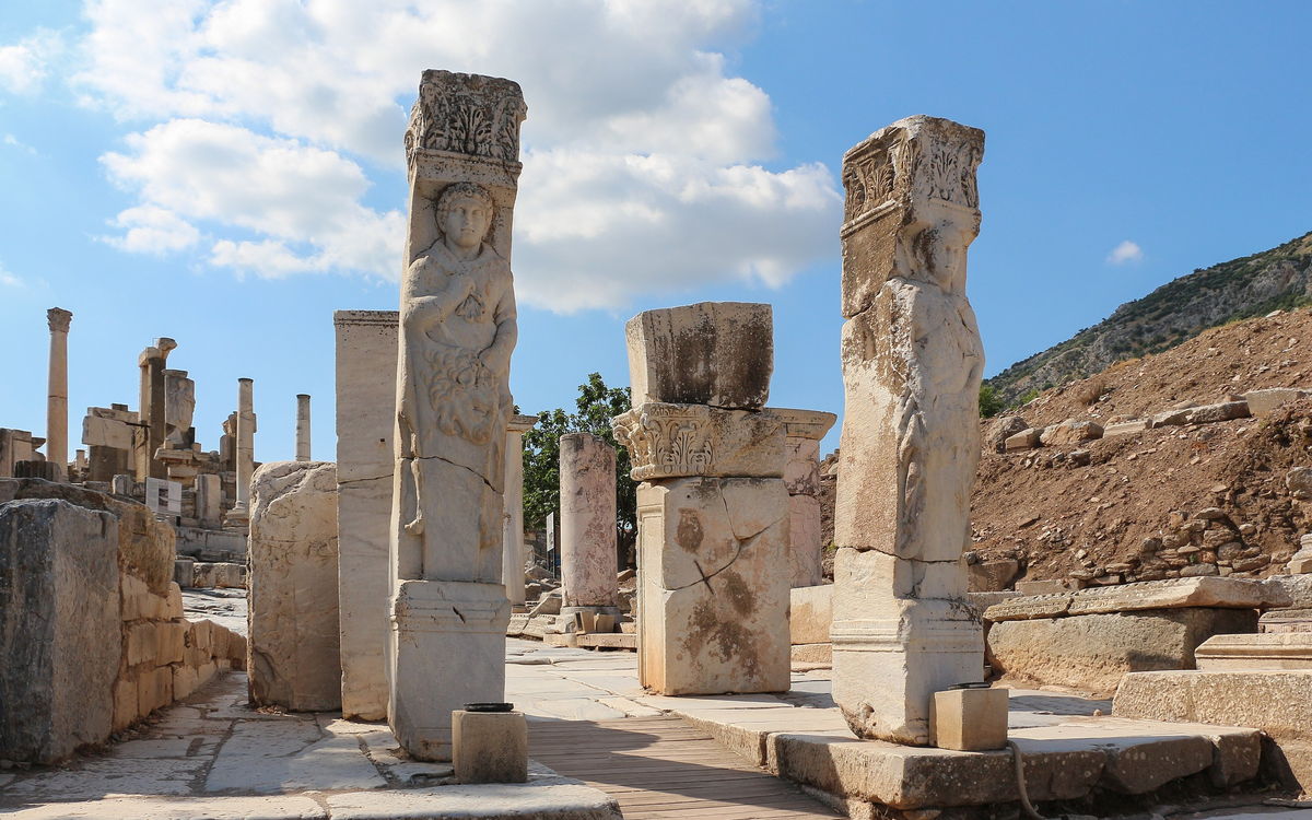 The carved pillars of the Gate of Hercules at the top of Curetes Street in Ephesus
